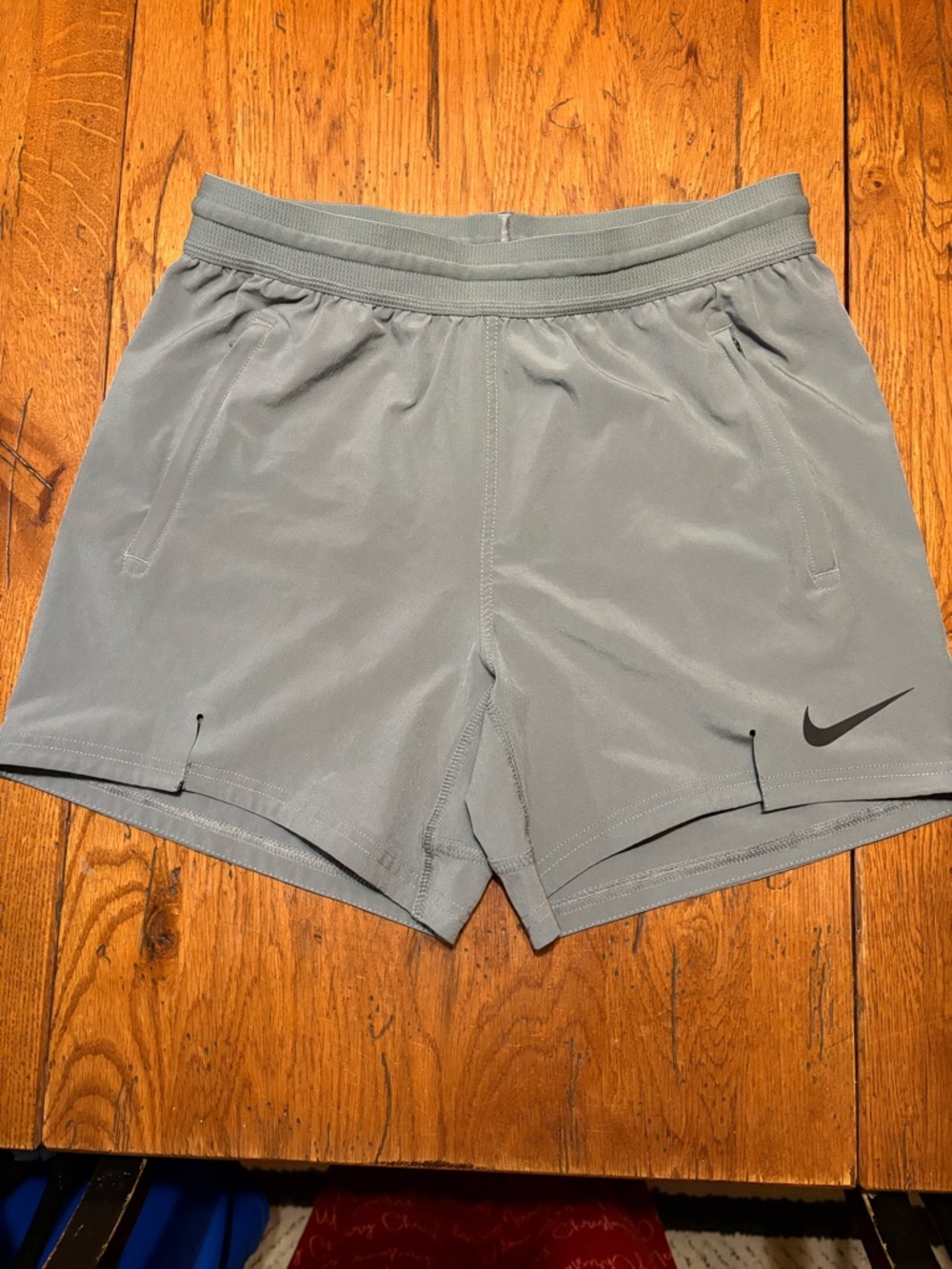 Nike Gray Performance Running Shorts with Black Swoosh